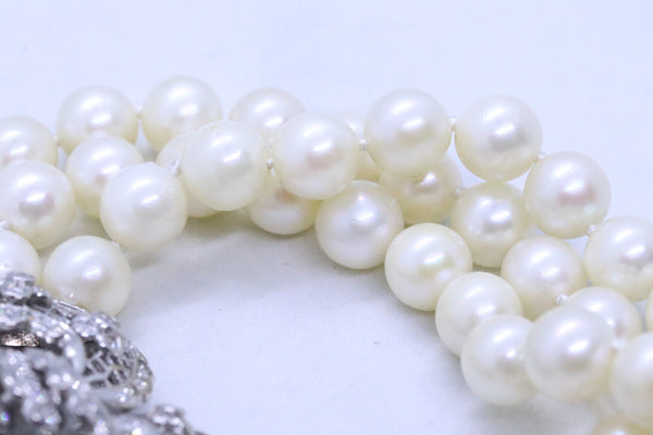 PEARLS BRACELET IN 14 KT WITH DIAMONDS CONVERTIBLE INTO BROOCH