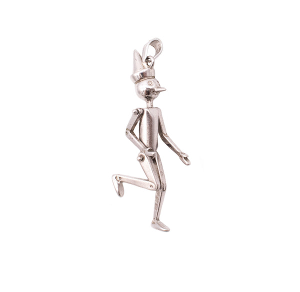 UNOAERRE 1970'S VINTAGE ARTICULATED PINOCCHIO PENDANT IN .925 STERLING SILVER