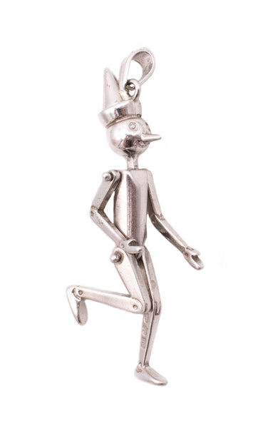 UNOAERRE 1970'S VINTAGE ARTICULATED PINOCCHIO PENDANT IN .925 STERLING SILVER