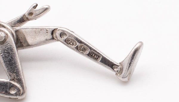 UNOAERRE 1970'S VINTAGE ARTICULATED PINOCCHIO PENDANT IN .925 STERLING SILVER