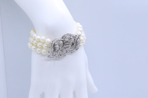 PEARLS BRACELET IN 14 KT WITH DIAMONDS CONVERTIBLE INTO BROOCH