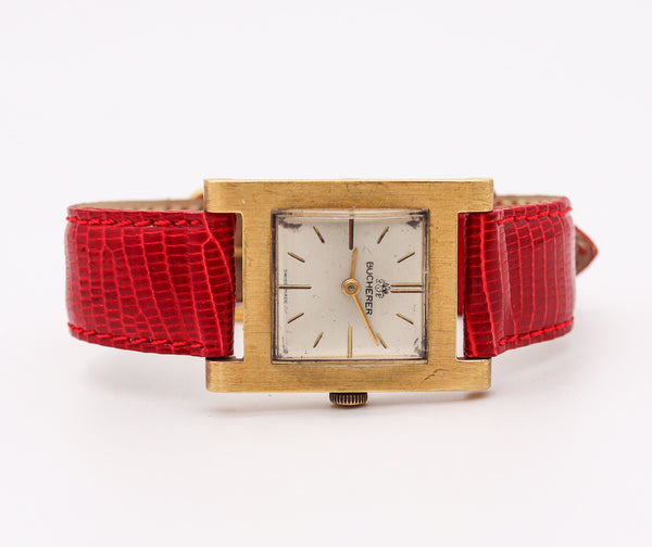 BUCHERER Swiss Wristwatch In 18Kt Yellow Gold With Red Lizard Leather Strap