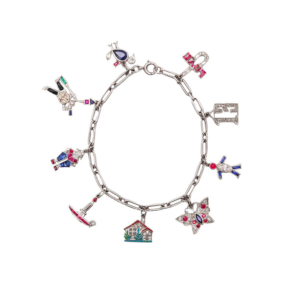 CARTIER 1930 Art Deco Charms Bracelet In Platinum With 6.04 Ctw In Diamonds & Gems