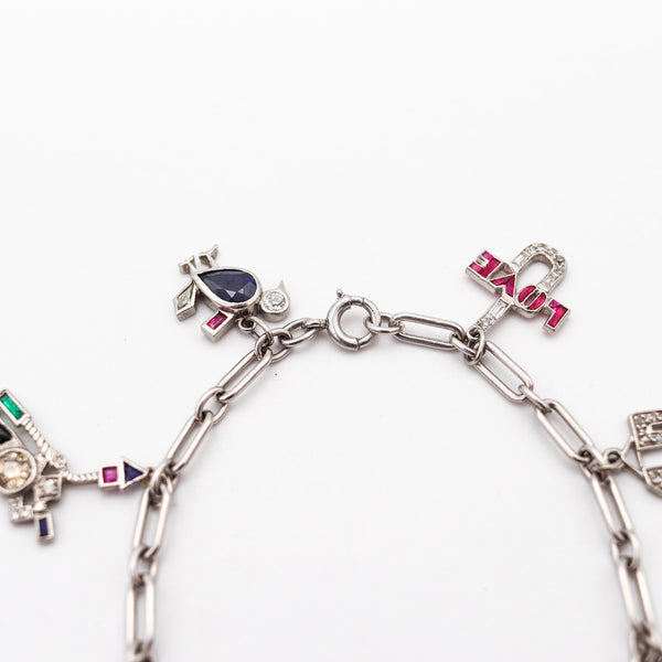 CARTIER 1930 Art Deco Charms Bracelet In Platinum With 6.04 Ctw In Diamonds & Gems