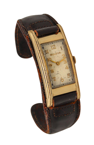 -Bulova President 1937 Art Deco Curvex Back In 14Kt Gold With Leather Cuff Bracelet