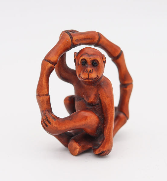 JAPAN 1880 Meiji Period Carved Wood Netsuke Of A Seated Monkey With Onyx Eyes