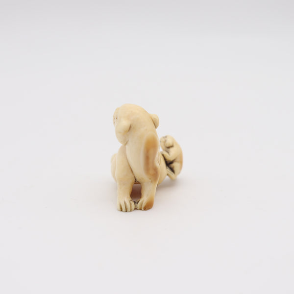 JAPAN 1885 Meiji Period Carved Netsuke Of Seated Foo-Dog With Onyx Eyes