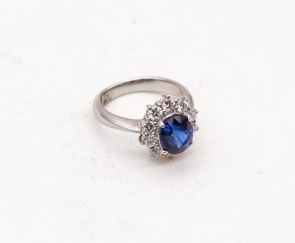 CLASSIC Halo Ring In Platinum With 3.14 Ctw In Sapphires And Diamonds