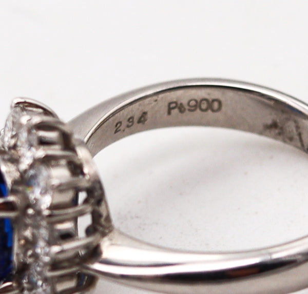 CLASSIC Halo Ring In Platinum With 3.14 Ctw In Sapphires And Diamonds