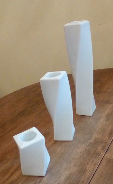 ANGELA CUMMINGS 1983 For Arita Set of Twisted Candlesticks In White Porcelain