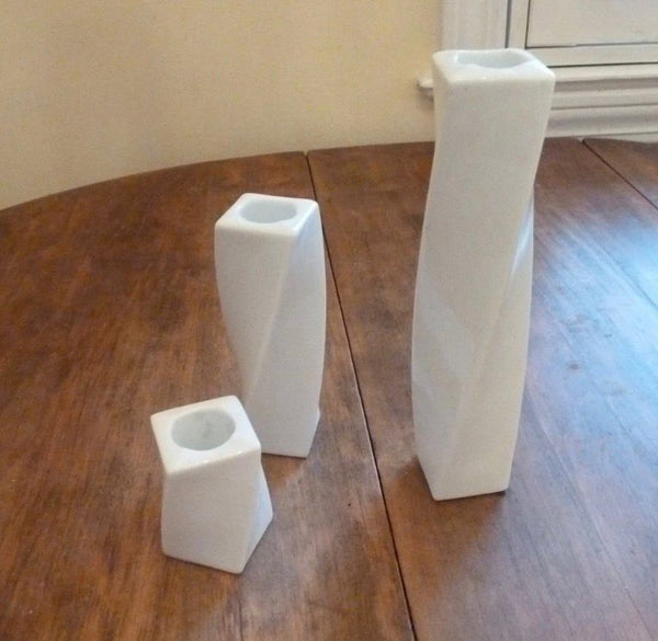 ANGELA CUMMINGS 1983 For Arita Set of Twisted Candlesticks In White Porcelain