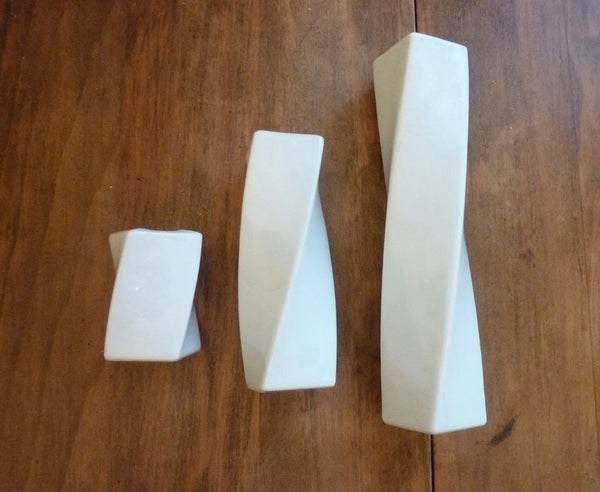 ANGELA CUMMINGS 1983 For Arita Set of Twisted Candlesticks In White Porcelain