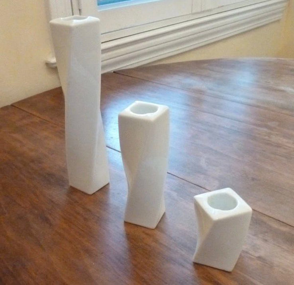 ANGELA CUMMINGS 1983 For Arita Set of Twisted Candlesticks In White Porcelain