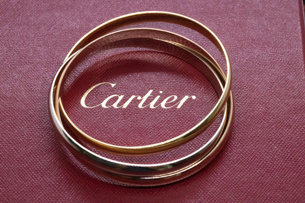 *Cartier Paris iconic Trinity bangles bracelet in 18 kt three-color gold 81.6 gm large