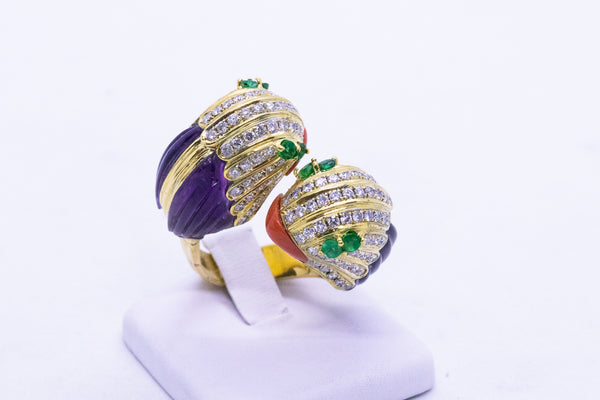 JEWELED PARROTS HEADS CROSS OVER 18 KT RING WITH DIAMONDS