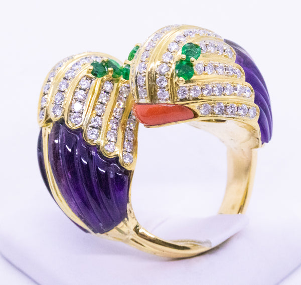 JEWELED PARROTS HEADS CROSS OVER 18 KT RING WITH DIAMONDS