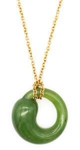 *Tiffany & Co. 1980 Elsa Peretti Eternal circle necklace in 18 kt yellow gold with nephrite jade
