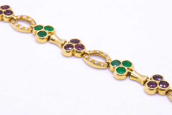 FRED OF PARIS 18 KT BRACELET WITH 7.89 Ctw RUBY, EMERALDS & DIAMONDS