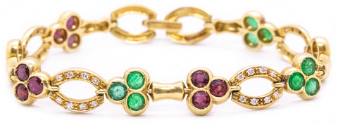 FRED OF PARIS 18 KT BRACELET WITH 7.89 Ctw RUBY, EMERALDS & DIAMONDS