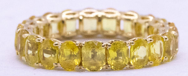 YELLOW SAPPHIRE ETERNITY 18 KT RING