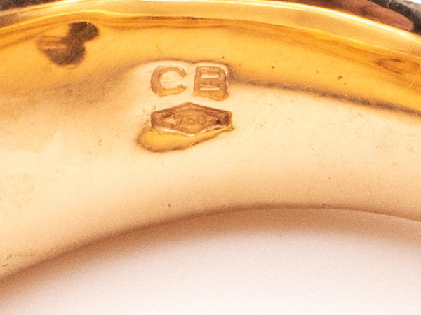 CARL BUCHERER SWISS 18 KT ROSE GOLD MODERNIST RING WITH CARVED EBONY