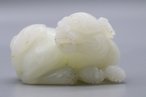 +China Qing Dynasty 18th Century Reclining Foo Dog Carved In White Nephrite Jade Gia Certified