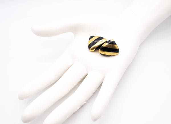 *Tiffany & Co 1970 Angela Cummings Stripes clips earrings in 18 kt yellow gold with black jade