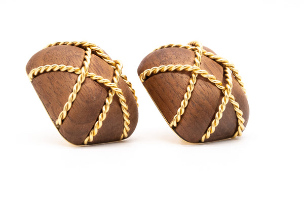 Seaman Schepps oversized ear clips in 18 kt gold with carvings of rose wood