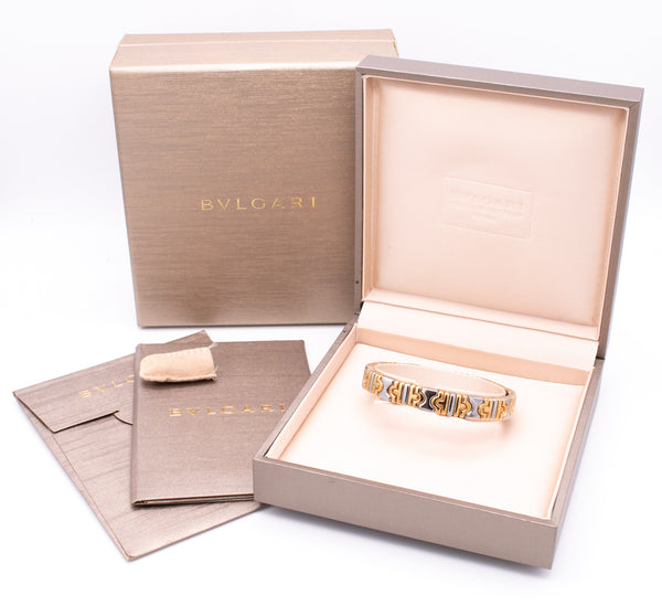 BVLGARI, ITALY TWO TONES PARENTESI BRACELET CUFF IN 18 KT GOLD & STEEL