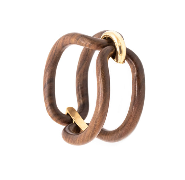 MODERNIST 1970 SEMI RIGID BRACELET IN 18 KT YELLOW GOLD WITH ROSE WOOD