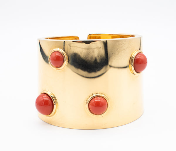 FRED JOAILLIER, PARIS 18 KT GOLD MASSIVE MODERN ARM CUFF WITH FOUR RED CORAL