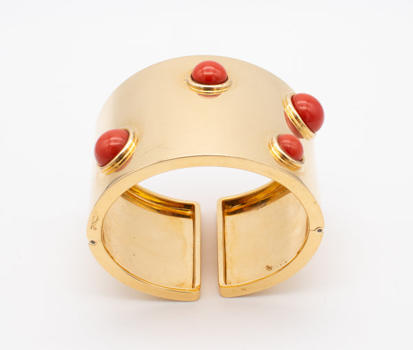 FRED JOAILLIER, PARIS 18 KT GOLD MASSIVE MODERN ARM CUFF WITH FOUR RED CORAL