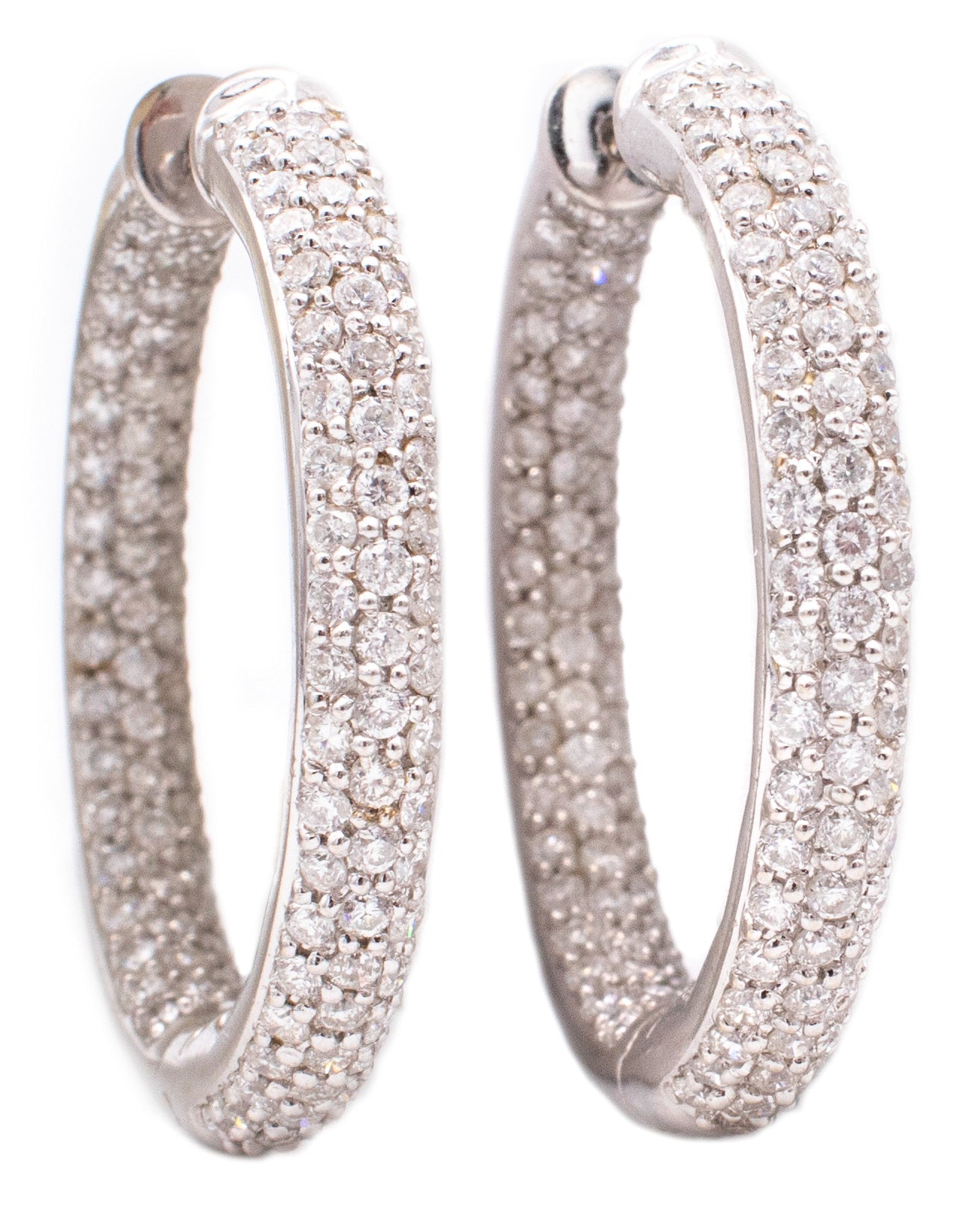 *Modern Italian hoops earrings in 18 kt white golf with 3.56 Cts of vs Diamonds