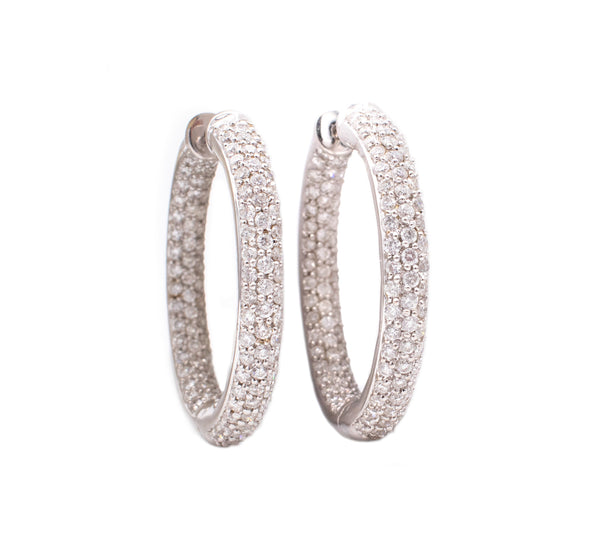 *Modern Italian hoops earrings in 18 kt white golf with 3.56 Cts of vs Diamonds