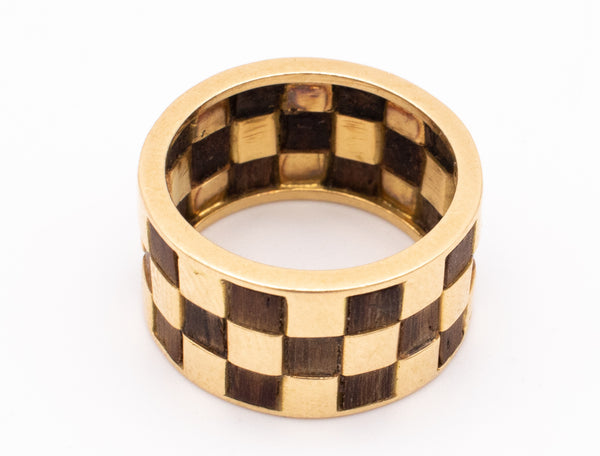 VAN CLEEF & ARPELS, 1970 PARIS 18 KT GOLD RING WITH CHECKERBOARD WOOD