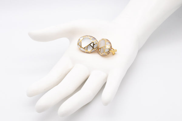 *Angela Cummings 1986 New York studios Geometric earrings in 18 kt yellow gold with white nacre