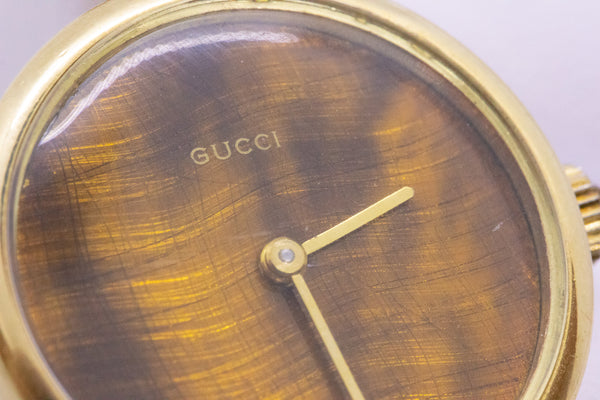 GUCCI 1960'S RARE RETRO 18 KT WRISTWATCH WITH GOLDEN TIGER EYE DIAL