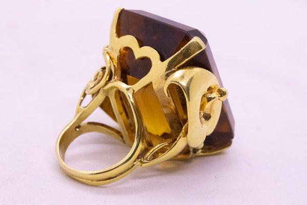 STATEMENT 18 KT MASSIVE RING WITH A 113.53 Cts MADEIRA ORANGE CITRINE