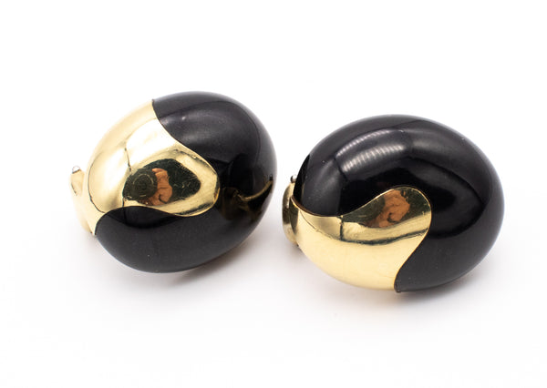 *Tiffany & Co 1970's Angela Cummings Oval clips earrings in 18 kt yellow gold with black Jade