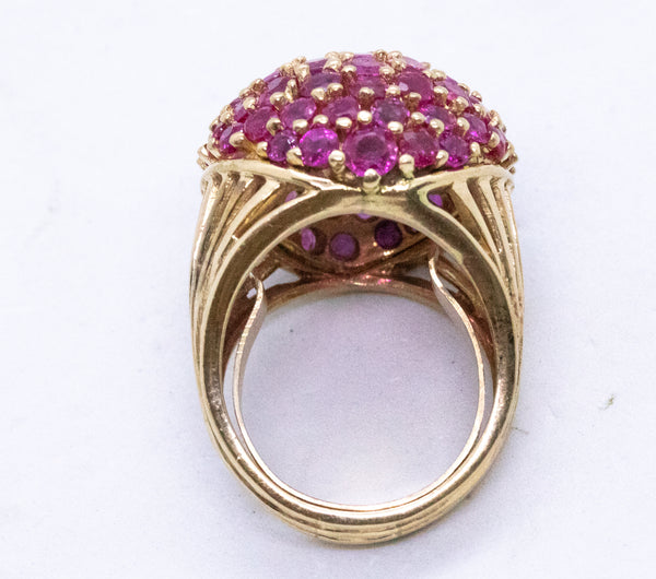 RETRO MID 1960'S BALL 18 KT COCKTAIL RING WITH 9.62 Cts OF RUBIES