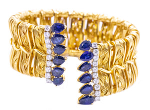 TEXTURED 18 KT VINTAGE BANGLE WITH 8.62 Cts OF DIAMONDS & SAPPHIRES