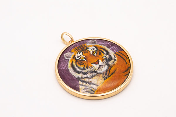 MICHELE DELLA VALLE 18 KT YELLOW GOLD PENDANT WITH A TIGER ON RED RUBY