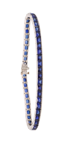 *Art-Deco 1930 platinum Riviera tennis bracelet with 7.52 Ctw in vivid blue spinel