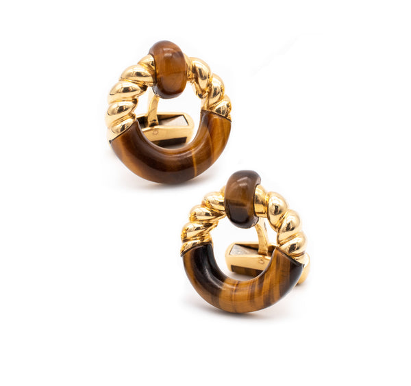 PIAGET PARIS 18 KT YELLOW GOLD CUFFLINKS WITH CARVED TIGER EYE