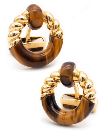 PIAGET PARIS 18 KT YELLOW GOLD CUFFLINKS WITH CARVED TIGER EYE