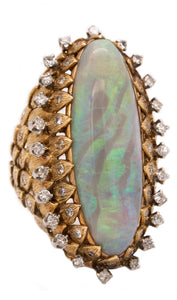 *Mid Century 1960 cocktail ring in textured 18 kt gold with 15.89 Ctw in diamonds & opal