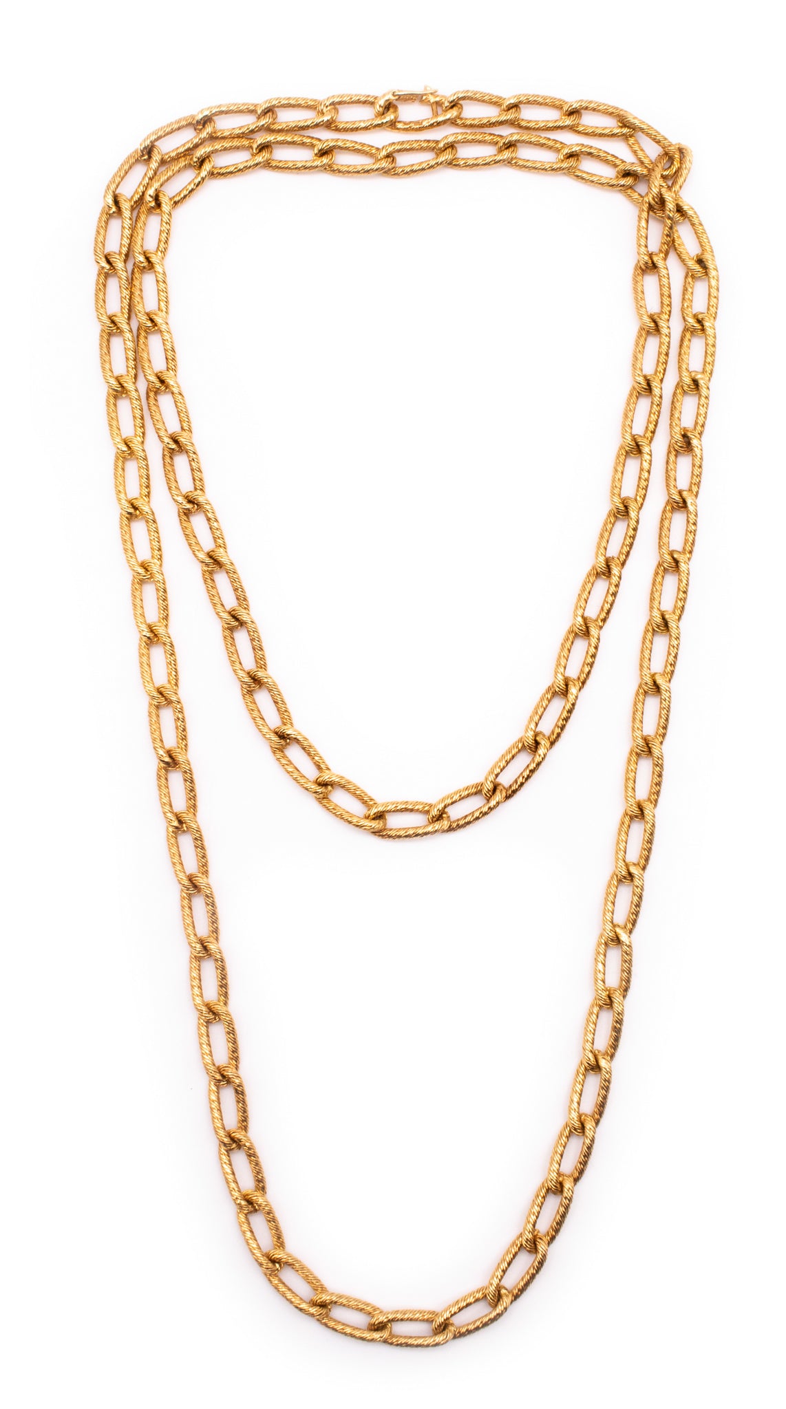 GEORGE L'ENFANT 1960'S PARIS, LONG CHAIN IN TEXTURED WOVEN 18 KT YELLOW GOLD