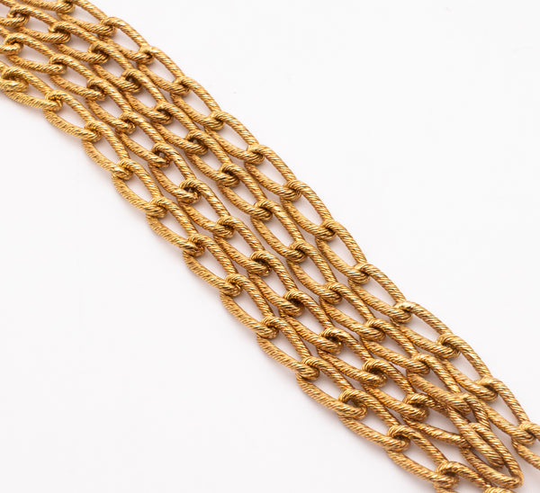 GEORGE L'ENFANT 1960'S PARIS, LONG CHAIN IN TEXTURED WOVEN 18 KT YELLOW GOLD