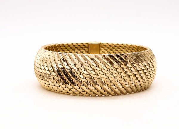 *Tiffany & Co. France 1960 by L’Enfant rare 18 kt gold mesh bracelet bangle