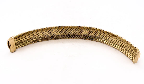 *Tiffany & Co. France 1960 by L’Enfant rare 18 kt gold mesh bracelet bangle